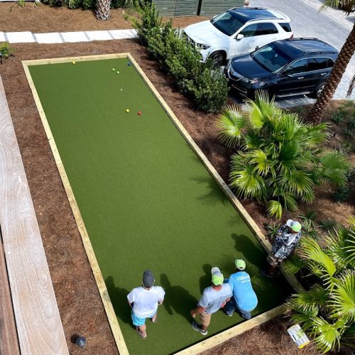 Synthetic grass offers the perfect surface for bocce ball.