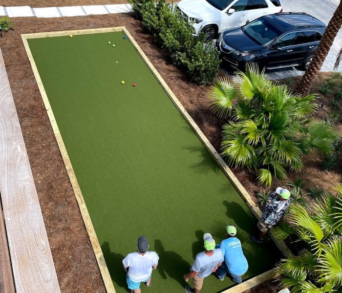 Synthetic grass offers the perfect surface for bocce ball.